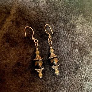 Onyx bead and silver tone dangle earrings